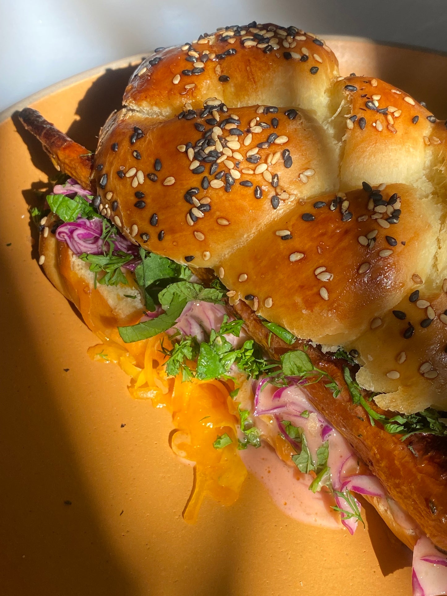 Roasted carrot & spiced coleslaw challah sandwich